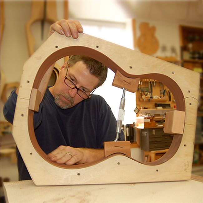 Jerry Levanduski building a guitar.